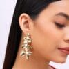 golden-anti-tarnish-flower-shape-earrings-model